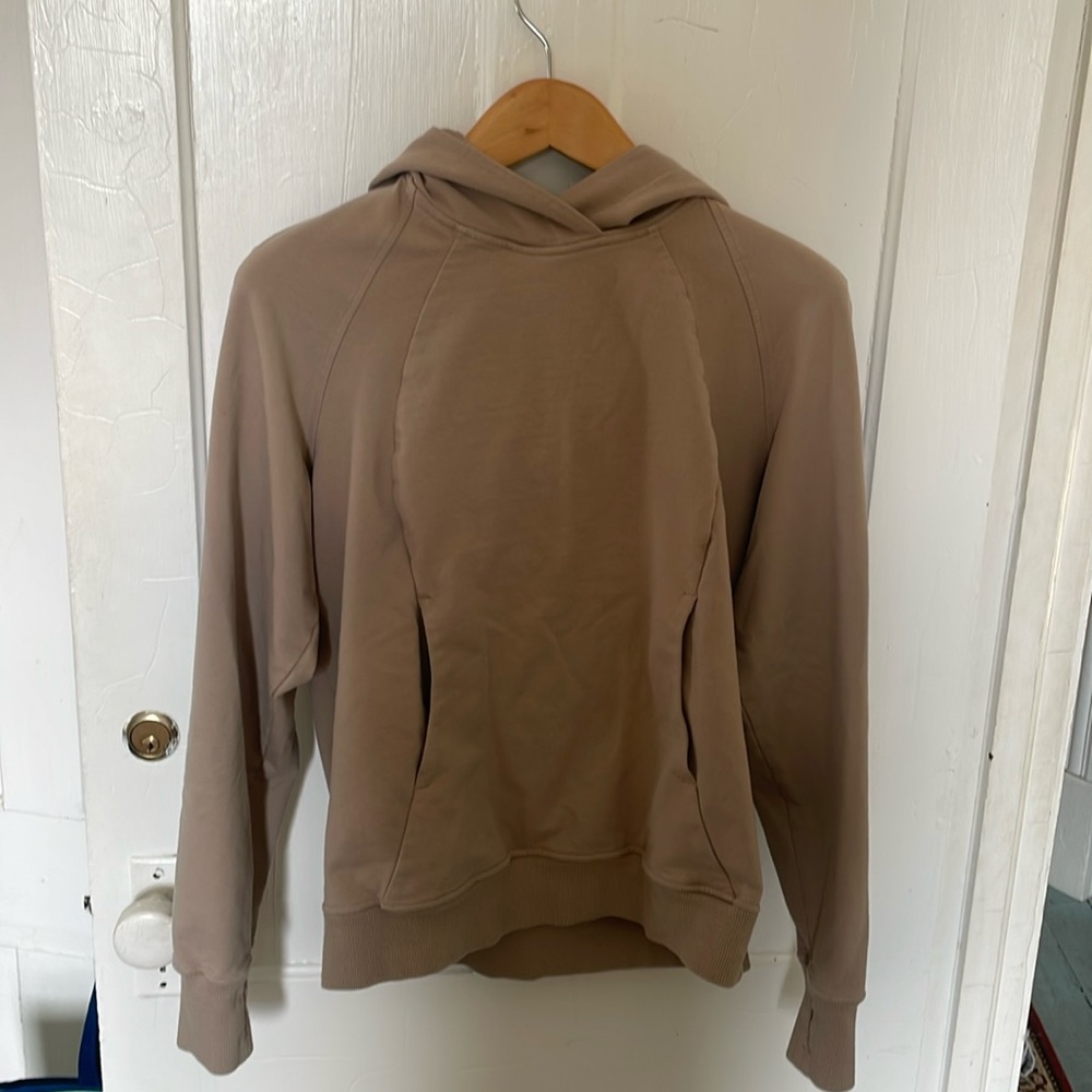 Lululemon pullover hoodie in a putty/tan color, kangaroo pocket